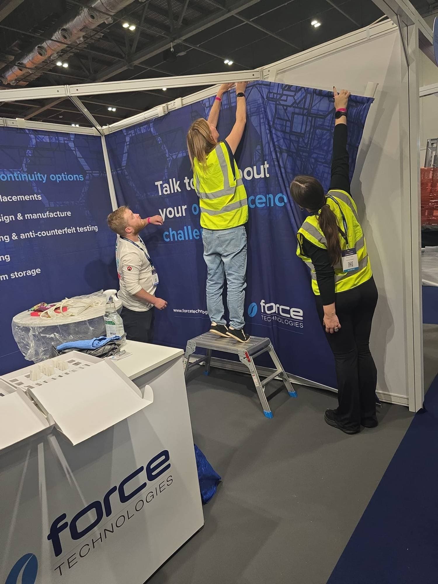 The Force Technologies team dressing stand G51 ahead of the show.