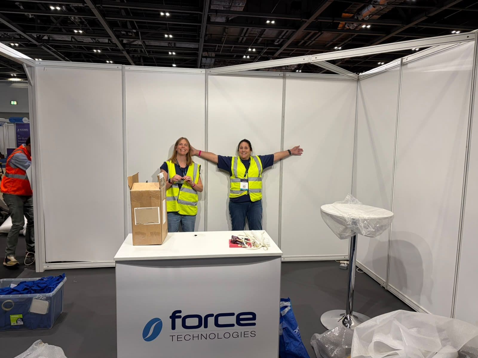 The Force Technologies team getting stand G51 ready at Microelectronics UK 2026.